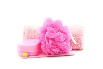 Obraz na płótnie Canvas pink toothbrush, soapbox, towel and shower scrubber
