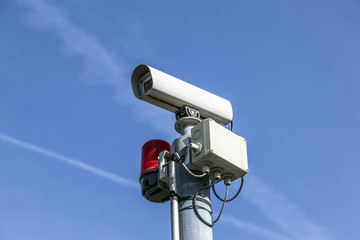security camera under blue sky