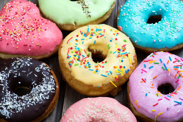 Donuts on a wooden background