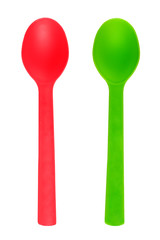 Red and green spoons made of plastic isolated white background