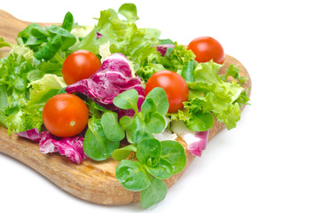 Assorted several kinds of fresh salad (corn, radicchio, lettuce)