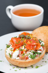 sandwich with salad of cottage cheese, tomato and salmon and tea