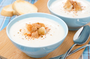 two bowls of cold cauliflower soup with cottage cheese