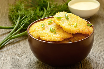 Potato pancakes in ceramic bowl