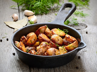 Roasted potato in a frying pan