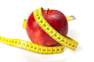 apple with tape on white background (health and diet concept)