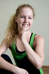 Fototapeta na wymiar Young Female Fitness Instructor smiling at work