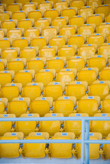 Fototapeta premium empty, yellow stadium seats