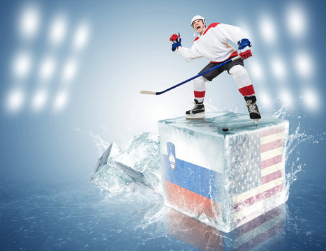 Slovenia-USA game. Spunky hockey player on ice cube