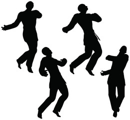 silhouettes of men and women in fist fight karate poses