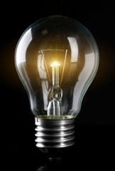 Light bulb on dark background