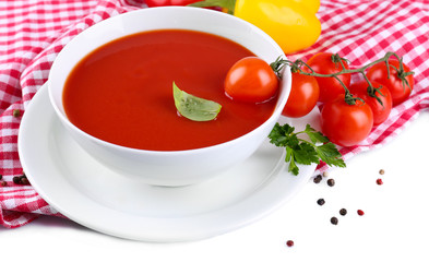 Tasty tomato soup and vegetables, isolated on white