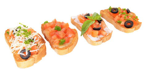 Delicious bruschetta with tomatoes isolated on white