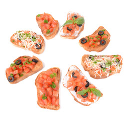 Delicious bruschetta with tomatoes isolated on white