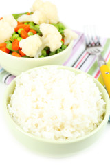 Cooked rice and vegetables close up