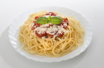 dish with spaghetti and tomato souce