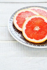 Sliced ​​grapefruit on a plate