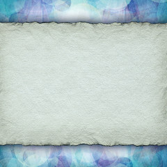 Handmade paper sheet on patterned background