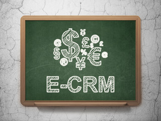 Business concept: Finance Symbol and E-CRM on chalkboard