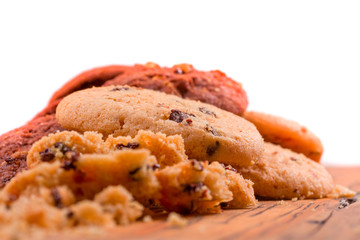 Stack of Chocolate chip cookies on wooden background.