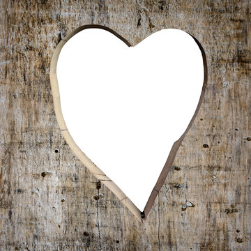 Heart shape carved into a plank