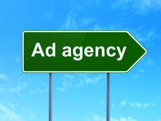 Advertising concept: Ad Agency on road sign background