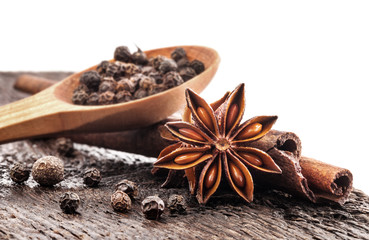 Different spices, Cinnamon, anise on wooden old table