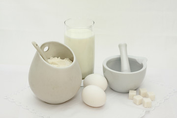 White foodstuff in white utensils
