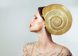 Extreme Hairstyle. Peculiar Woman with Snail. Headwear