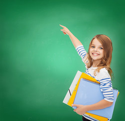 cute girl with folders pointing at virtual screen