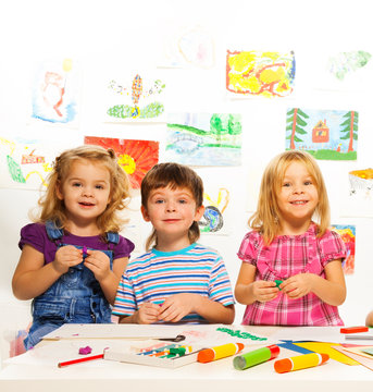 Three creative kids on the lesson