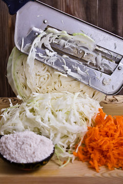 Cutting and salting cabbage