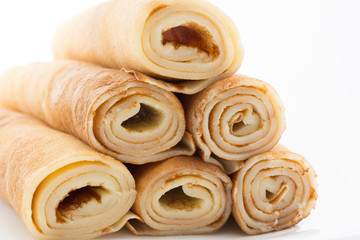pancake with honey on white background