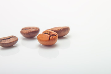 Obraz na płótnie Canvas Isolate coffee beans. Macro. White backgound