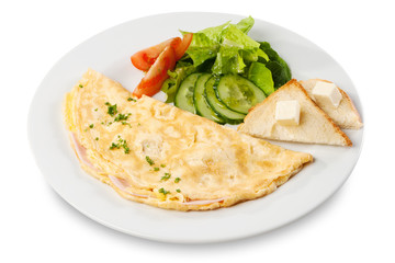 Omelette with ham, tomato and cucumber