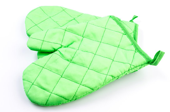 Green oven glove on isolated white background