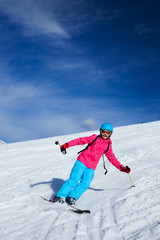 Fototapeta na wymiar Girl on skis.