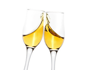 Two wineglasses with wine splash