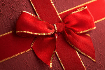 Gift box with red ribbon