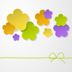 color paper flowers on the white background