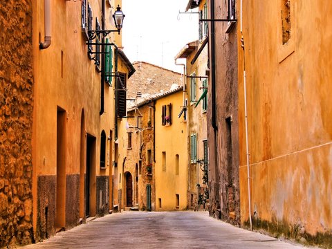 Fototapeta Rustic medieval street in a town in Tuscany, Italy