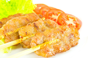 grilled pork meat on white plate