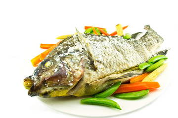 Tilapia grilled on white dish