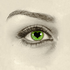Green eye with heart shape in it