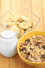 Delicious and healthy cereal in bowl with milk