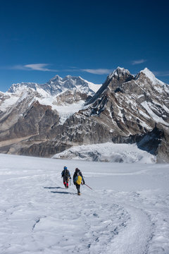 Mountaineers with Mt. Everest, Himalayas of Nepal