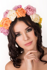 Naklejka premium Beautiful young woman with floral wreath. Fashion shot. 