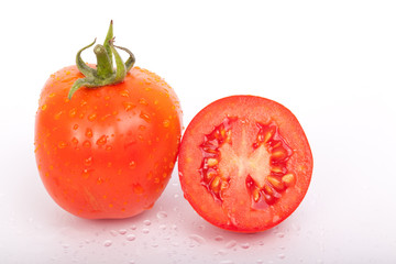 Fresh tomatoes isolated on white background