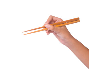 Female hand using chopstick over white background