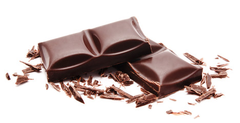 Dark chocolate bars stack with crumbs isolated on a white